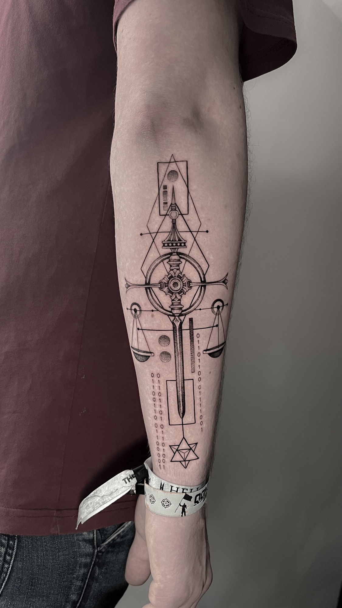 Sword and Scale Tattoo